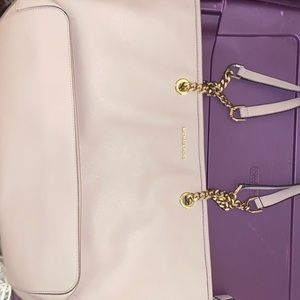 Slight used , small mark on front of purse.